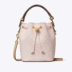 Tory Burch Mini Monogram Embossed Bucket Bag.